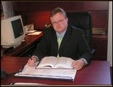 Thomas Tabor, Jr., Esquire working at his desk